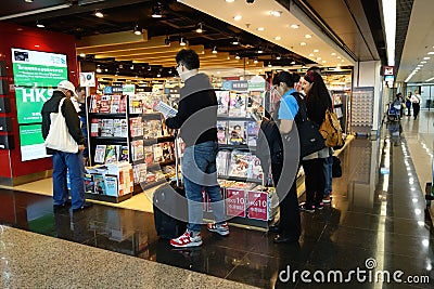 Customers shop for books on 23 Novemer 2014 in Hong Kong Airport