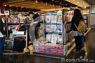 Customers shop for books on 23 Novemer 2014 in Hong Kong Airport