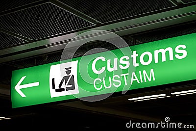 Customs sign in Airport and direction arrow