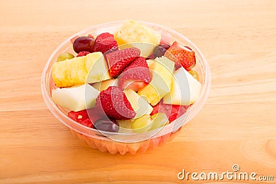Cut Fresh Fruit in Plastic Bowl