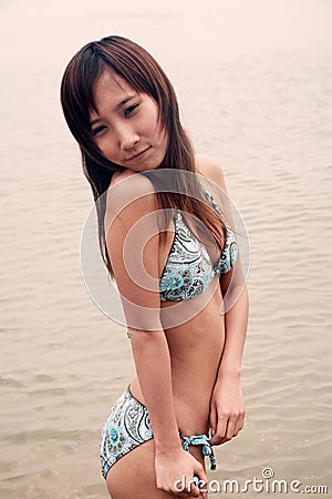 Cute Asian girl in a bikini