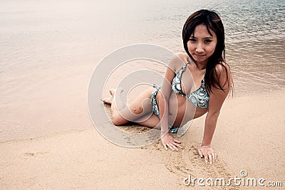 Cute Asian girl in a bikini