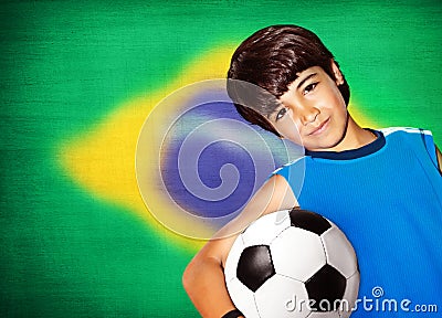 Cute boy playing football