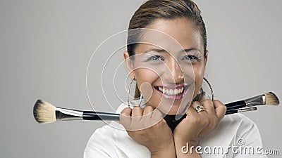 Cute Make-up Artist with Brushes