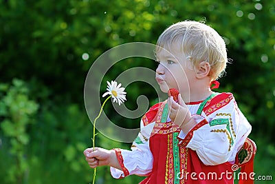 Cute preschooler girl in traditional Russian dress