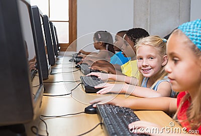 Cute pupils in computer class