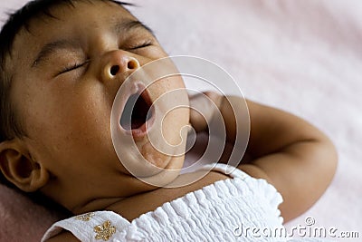 Cute Yawning Indian Baby
