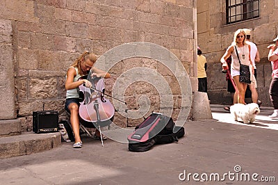 Cute young cellist street musician