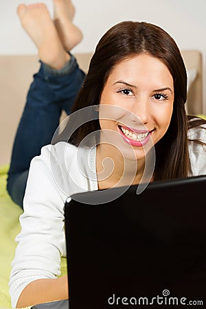 Cute young woman, surfing the internet