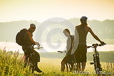 Cyclists relax biking outdoors