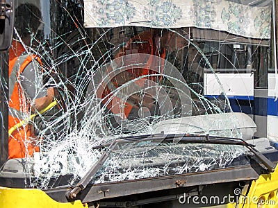 Damaged glass on bus, road accident details,