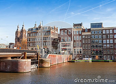 Damrak street in historical center of Amsterdam