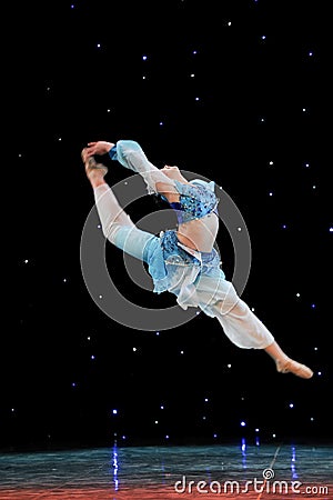 A dancer leaping into the sky