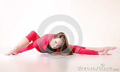 Dancer woman sit on half twine