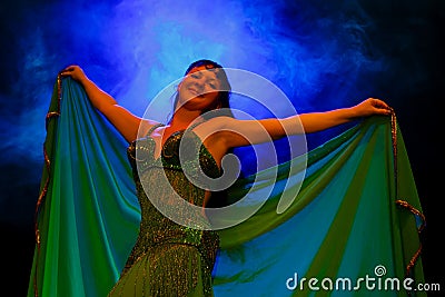 Dancing woman in oriental costume