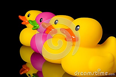 Dare to be different - rubber ducks on black