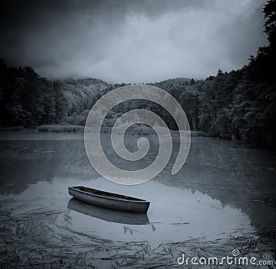 Dark Lake and Boat