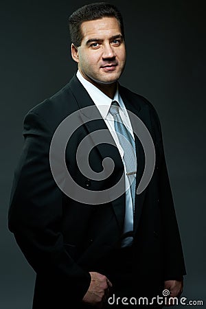 Dark portrait of handsome stylish young man