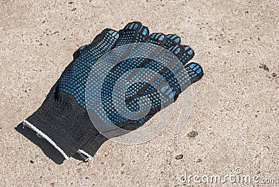 Dark protective fabric gloves with rubber slips