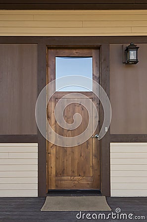 Dark wood front door of a home