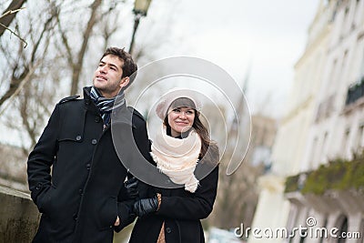 Dating couple walking in Paris