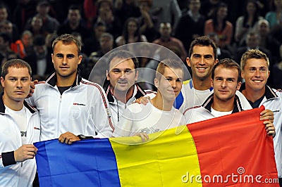 Davis Cup, the Romanian players are celebrating the victory with the Romanian flag