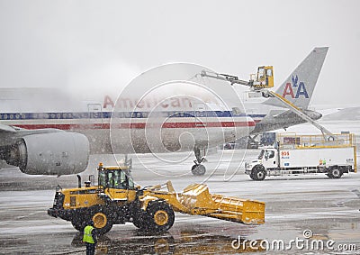 De-icing Aircraft during a snow storm