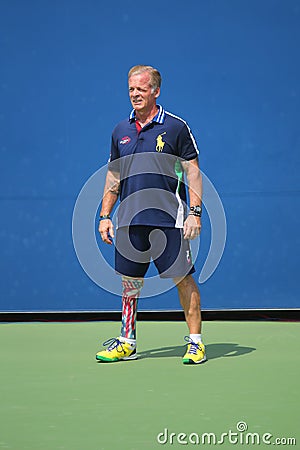 Decorated US Army Veteran Ryan McIntosh with carbon-fiber prosthetic right leg works as US Open ballperson at US Open 2014