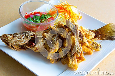 Deep fried whole sea perch with fish sauce