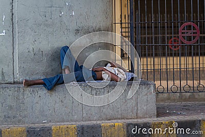 DELHI, INDIA-AUGUST 29: Hindu sleeping on the street on August 2