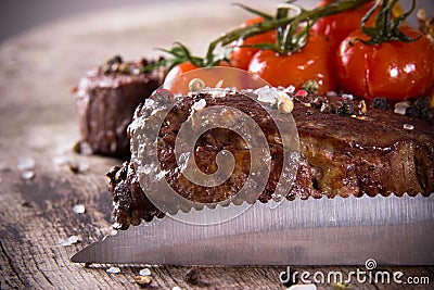 Delicious beef steak with knife