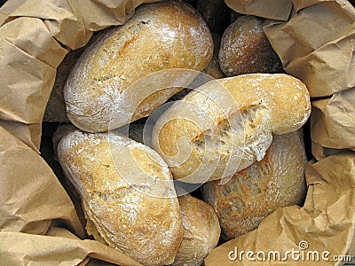 Delicious bread in a paper bag