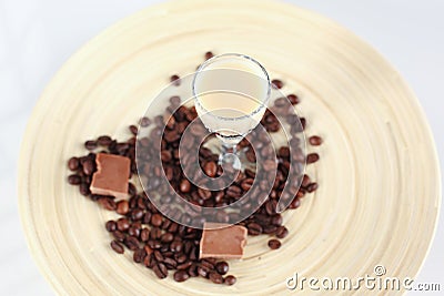 Delicious coffee cocktail with coffee beans and chocolate