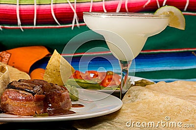 Delicious Mexican food with frozen Margarita drink