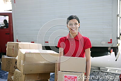 Delivery courier or mover delivering cardboards