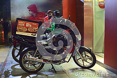 Delivery Motorbike in Front of Pizza Hut Delivery in Lima, Peru