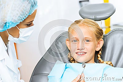 Dentist inspecting patient