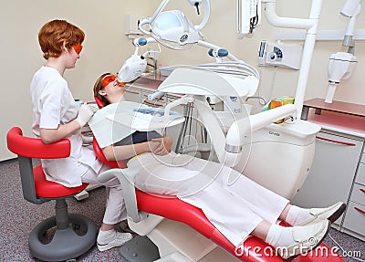 Dentist at work in dental room