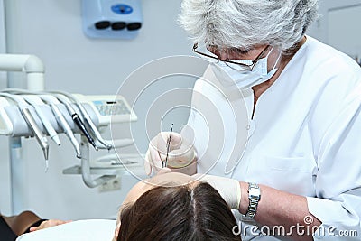 Dentist at work in dental room