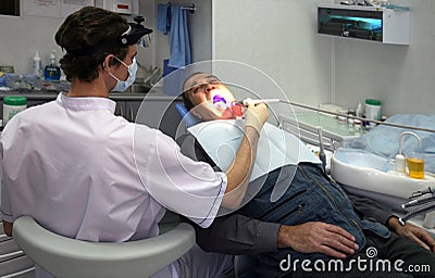 Dentist at work in dental room