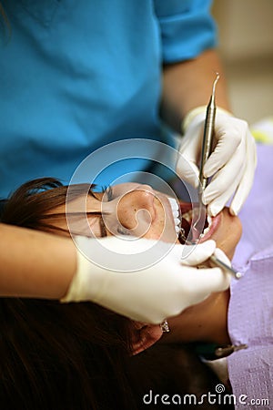 Dentist working on patients mouth
