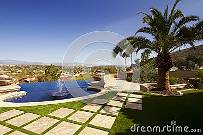 Desert mansion home back yard pool and fountains
