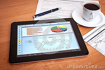 Desk with digital tablet. Marketing Research.