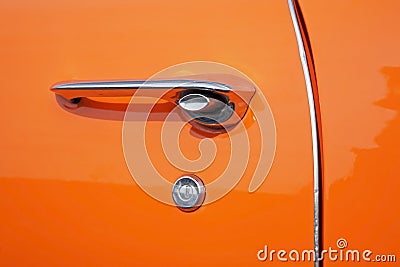 Detail of old orange car