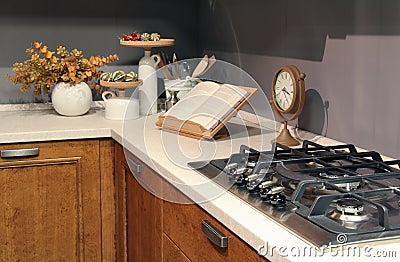 Detail of stainless burners in a elegant country kitchen