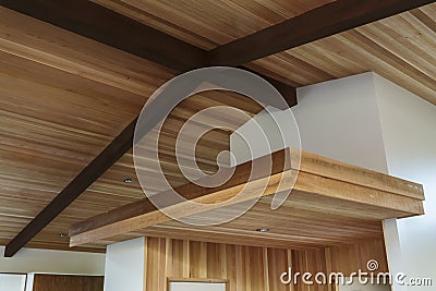 Detail of wood beam ceiling in a modern house entryway
