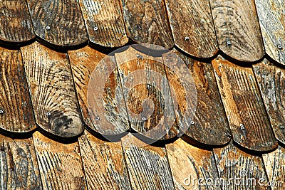 Detail of wooden clapboard roof with steel drive screws