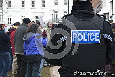 A Devon & Corwall police watches the Occupy Exeter