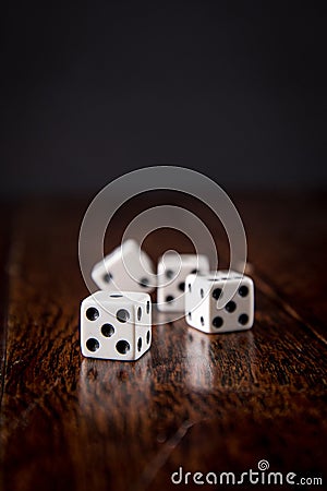 Dice on Wood Table Background
