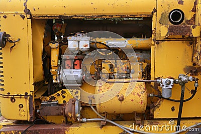 Diesel yellow tractor truck engine detail